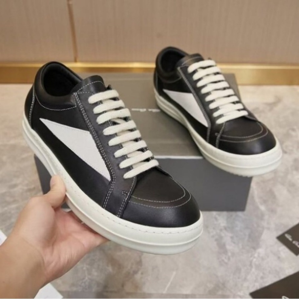 Black Low-Top Sneakers with White Stripe
